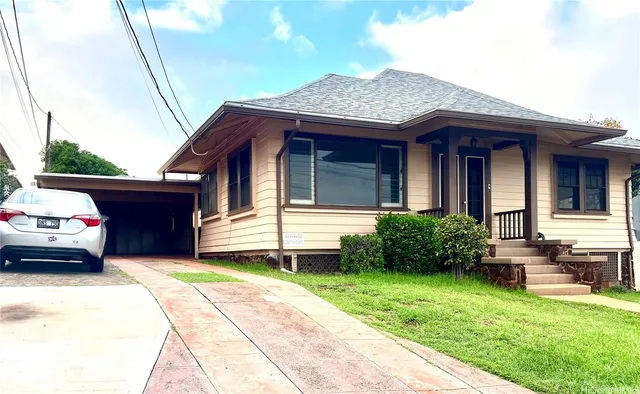 a house view with a garden space