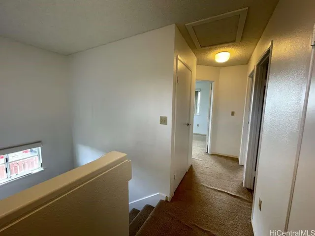 a bathroom with a sink toilet vanity and shower