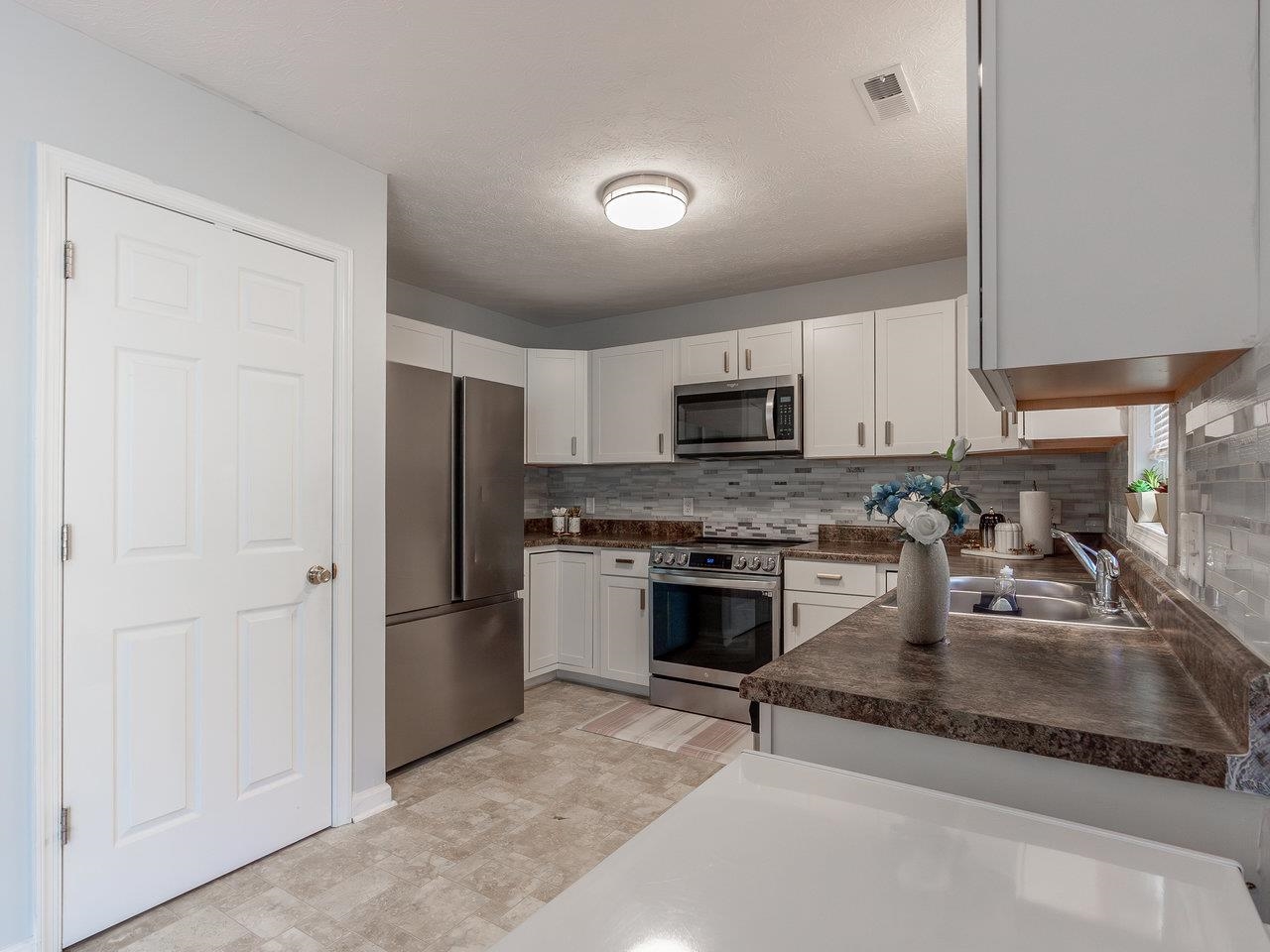 3192 Hebron Court Harrisonburg, VA 22801 - Photo 23 of 75 a kitchen with a refrigerator stove and microwave