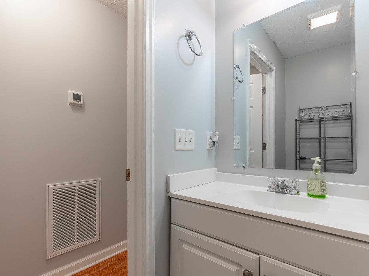 3192 Hebron Court Harrisonburg, VA 22801 - Photo 31 of 75 a bathroom with a sink and a mirror