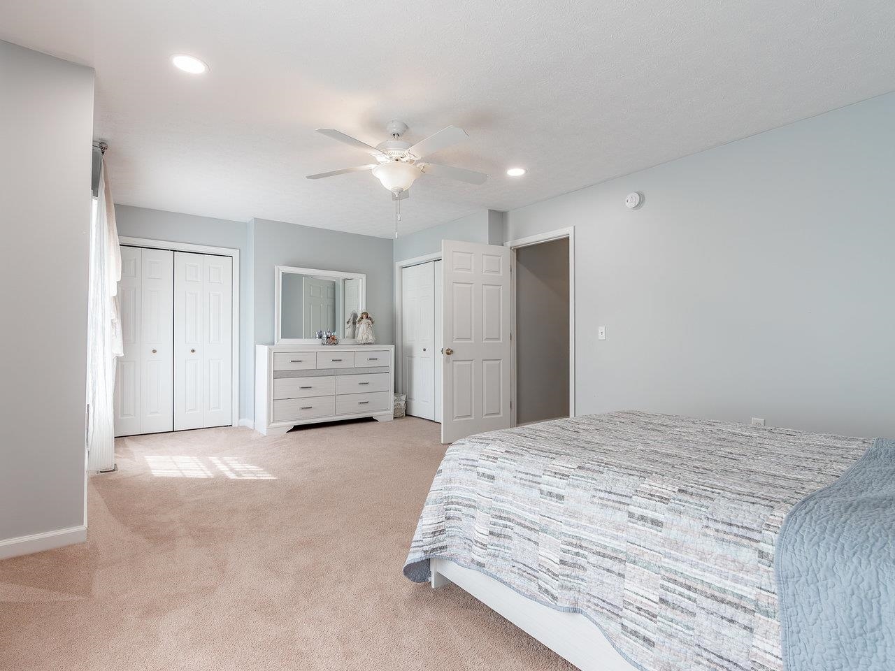 3192 Hebron Court Harrisonburg, VA 22801 - Photo 44 of 75 a spacious bedroom with a large bed and closet
