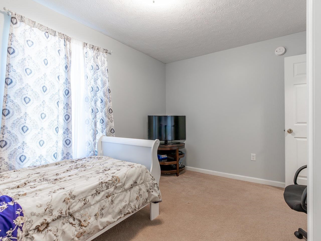 3192 Hebron Court Harrisonburg, VA 22801 - Photo 51 of 75 a bedroom with a bed and a television