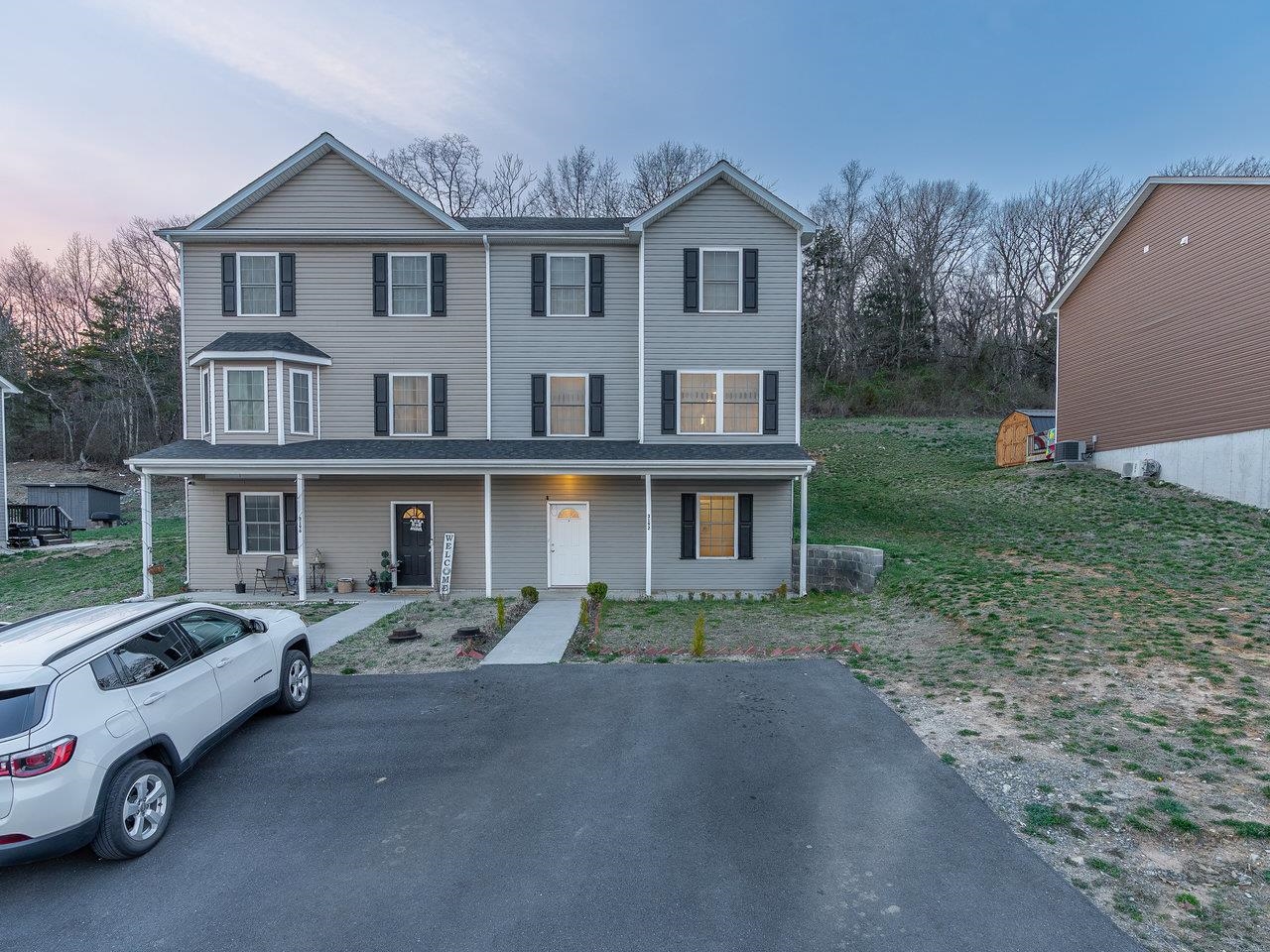 3192 Hebron Court Harrisonburg, VA 22801 - Photo 61 of 75 a car parked in front of a house with a yard