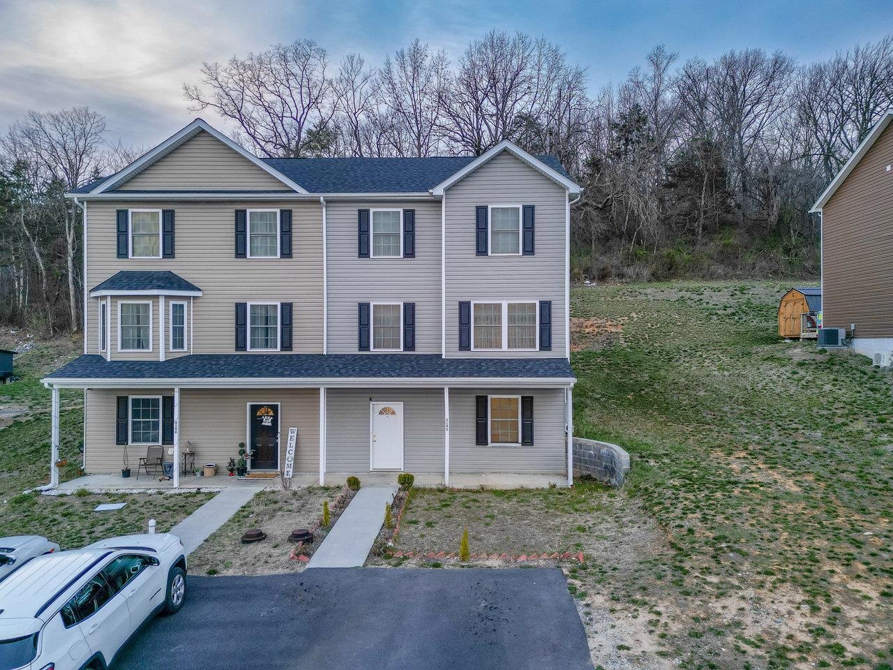 3192 Hebron Court Harrisonburg, VA 22801 - Photo 68 of 75 a view of a yard in front of a house with large windows