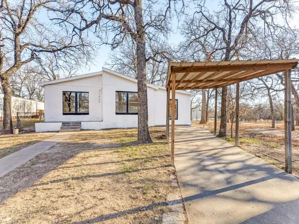 a house view with a outdoor space