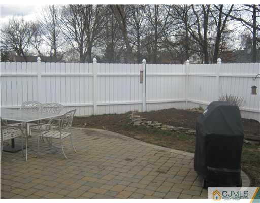 17 Markham Road Edison, NJ 08817 - Photo 11 of 13 a view of a backyard