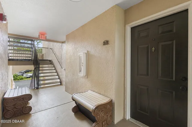 a view of an entryway with stairs