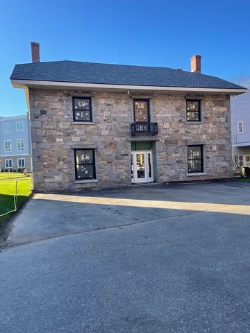 a view of a house with a swimming pool