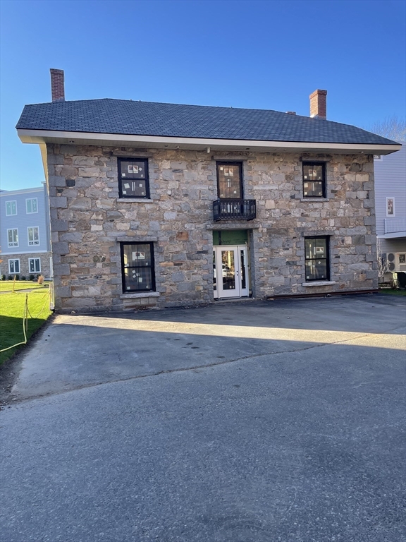 a view of a house with a swimming pool