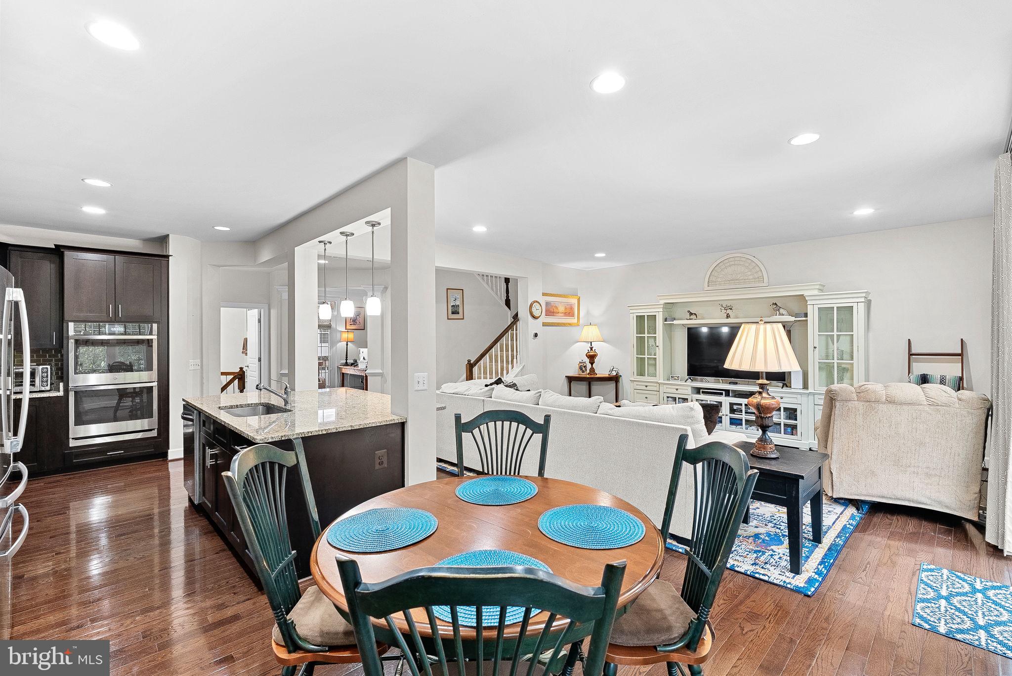 20281 Center Brook Square Sterling, VA 20165 - Photo 13 of 51 a view of a dining room with furniture and wooden floor