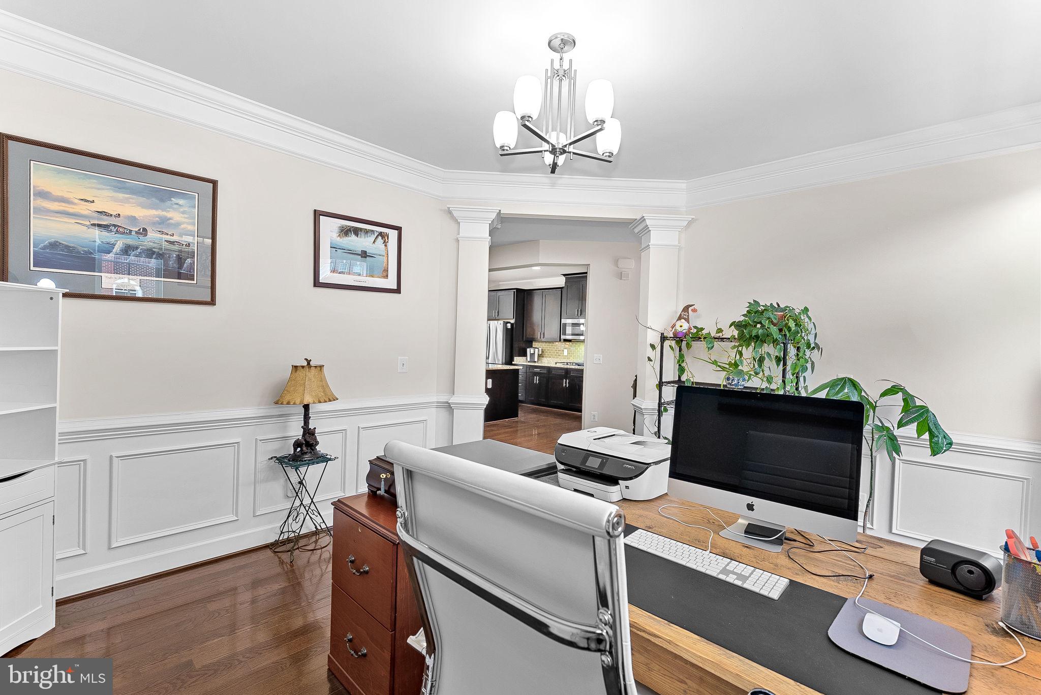 20281 Center Brook Square Sterling, VA 20165 - Photo 21 of 51 a view of a workspace with furniture and wooden floor