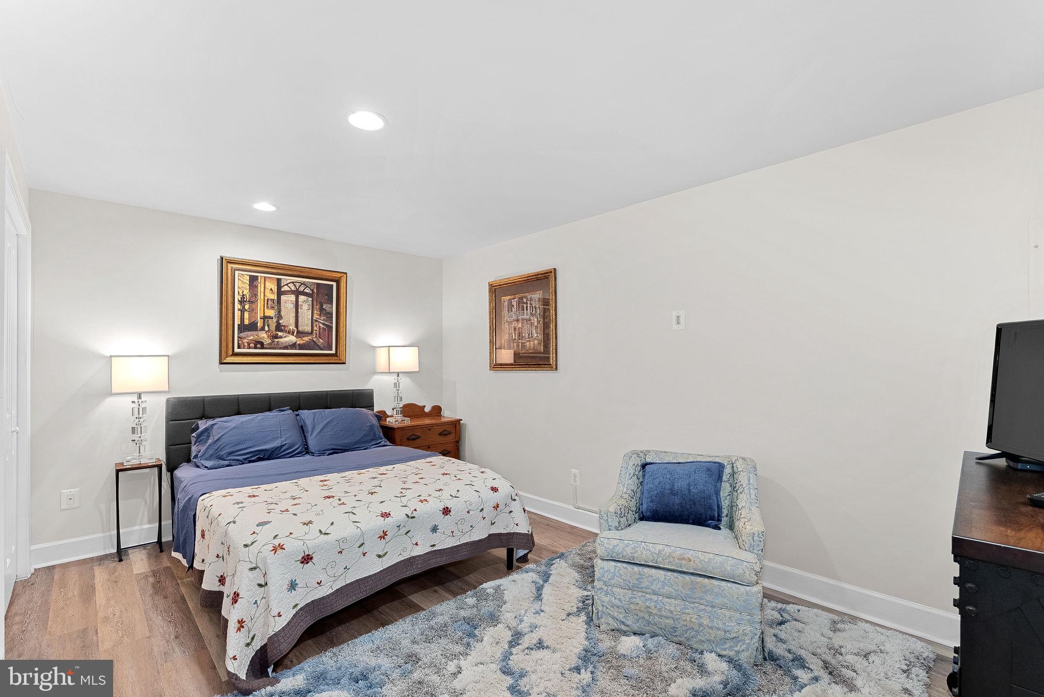 20281 Center Brook Square Sterling, VA 20165 - Photo 31 of 51 a bedroom with a bed and a couch