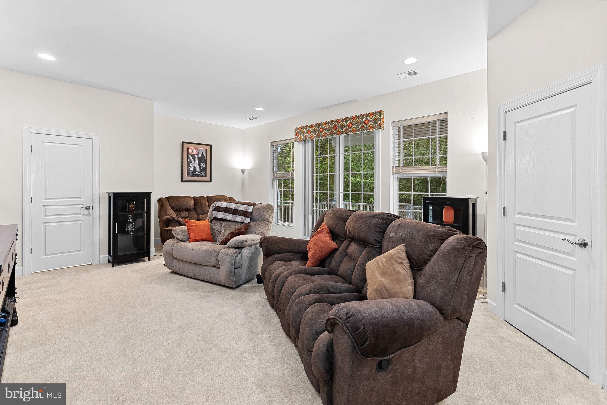 20281 Center Brook Square Sterling, VA 20165 - Photo 34 of 51 a living room with furniture and a large window