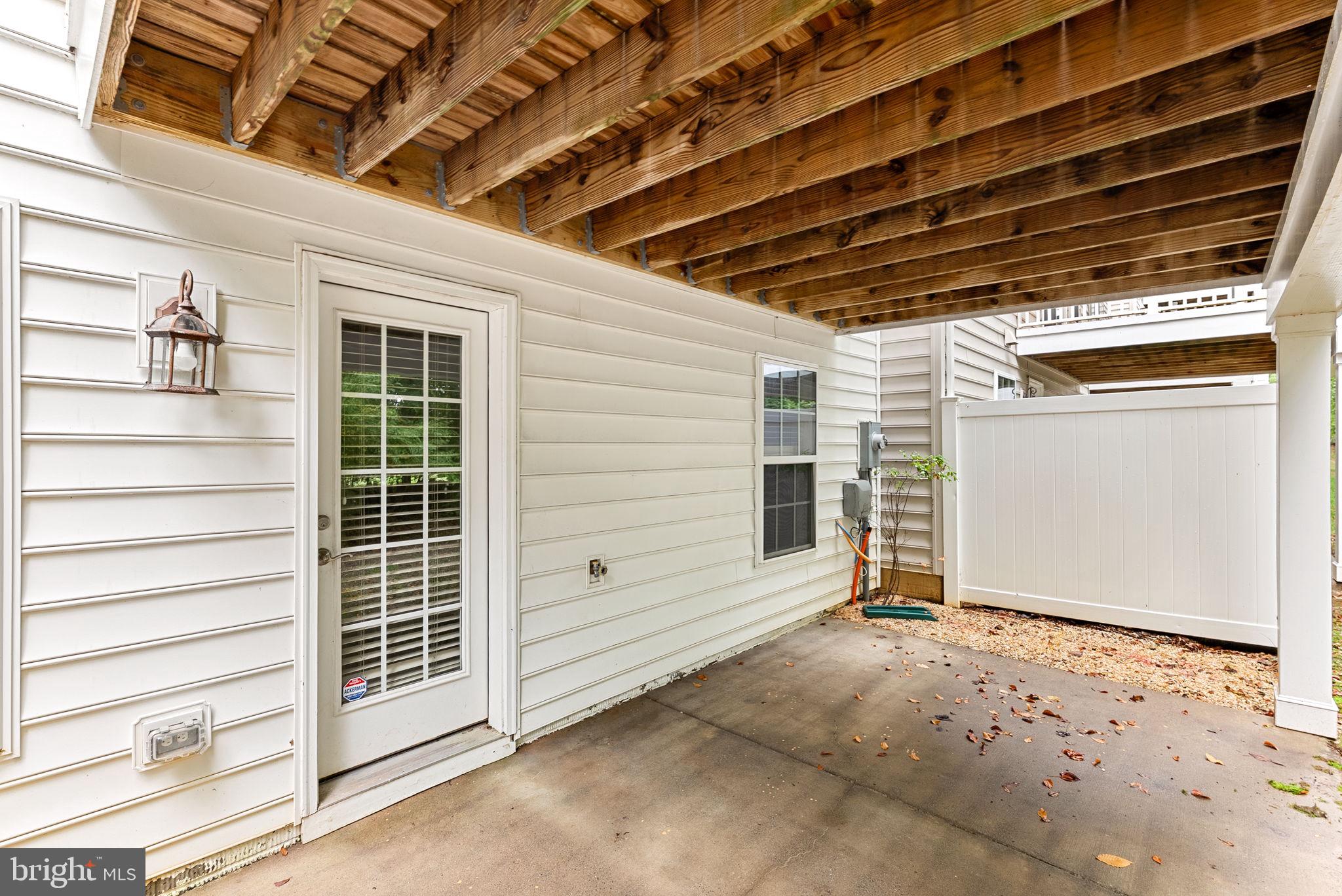 20281 Center Brook Square Sterling, VA 20165 - Photo 41 of 51 a view of house with wooden door