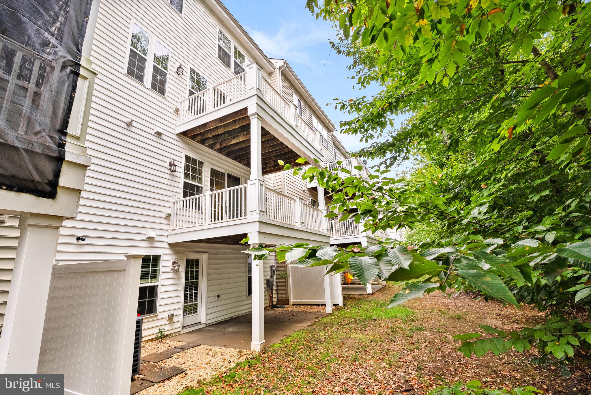 20281 Center Brook Square Sterling, VA 20165 - Photo 43 of 51 a view of a house with a tree