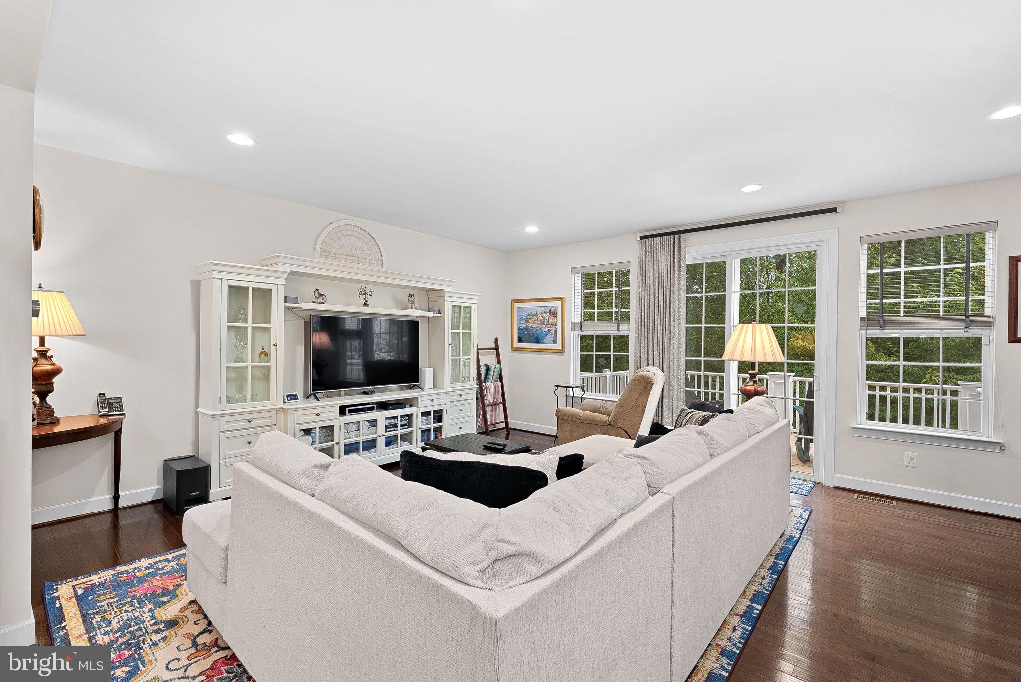 20281 Center Brook Square Sterling, VA 20165 - Photo 6 of 51 a living room with furniture and a flat screen tv