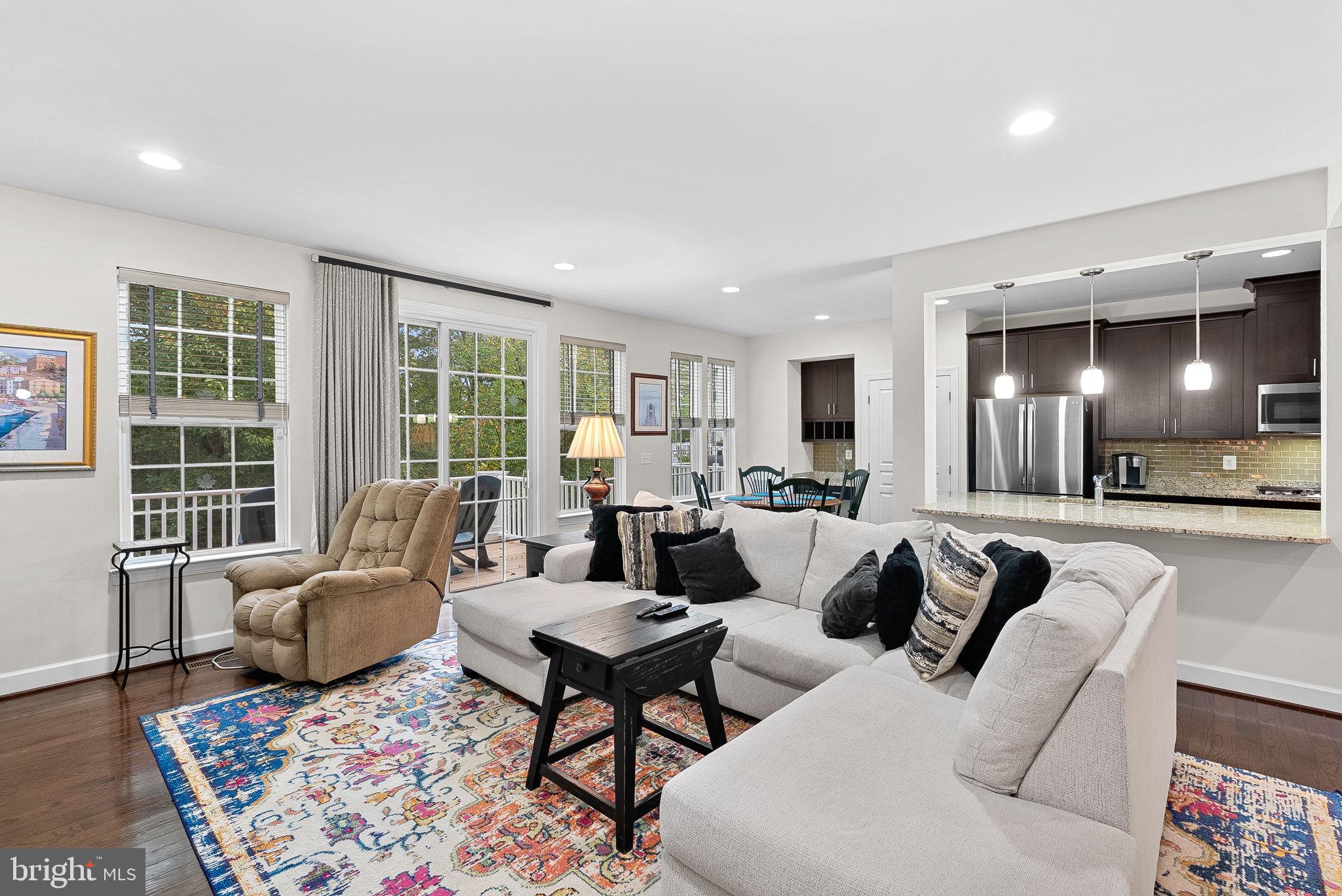 20281 Center Brook Square Sterling, VA 20165 - Photo 7 of 51 a living room with furniture and a large window