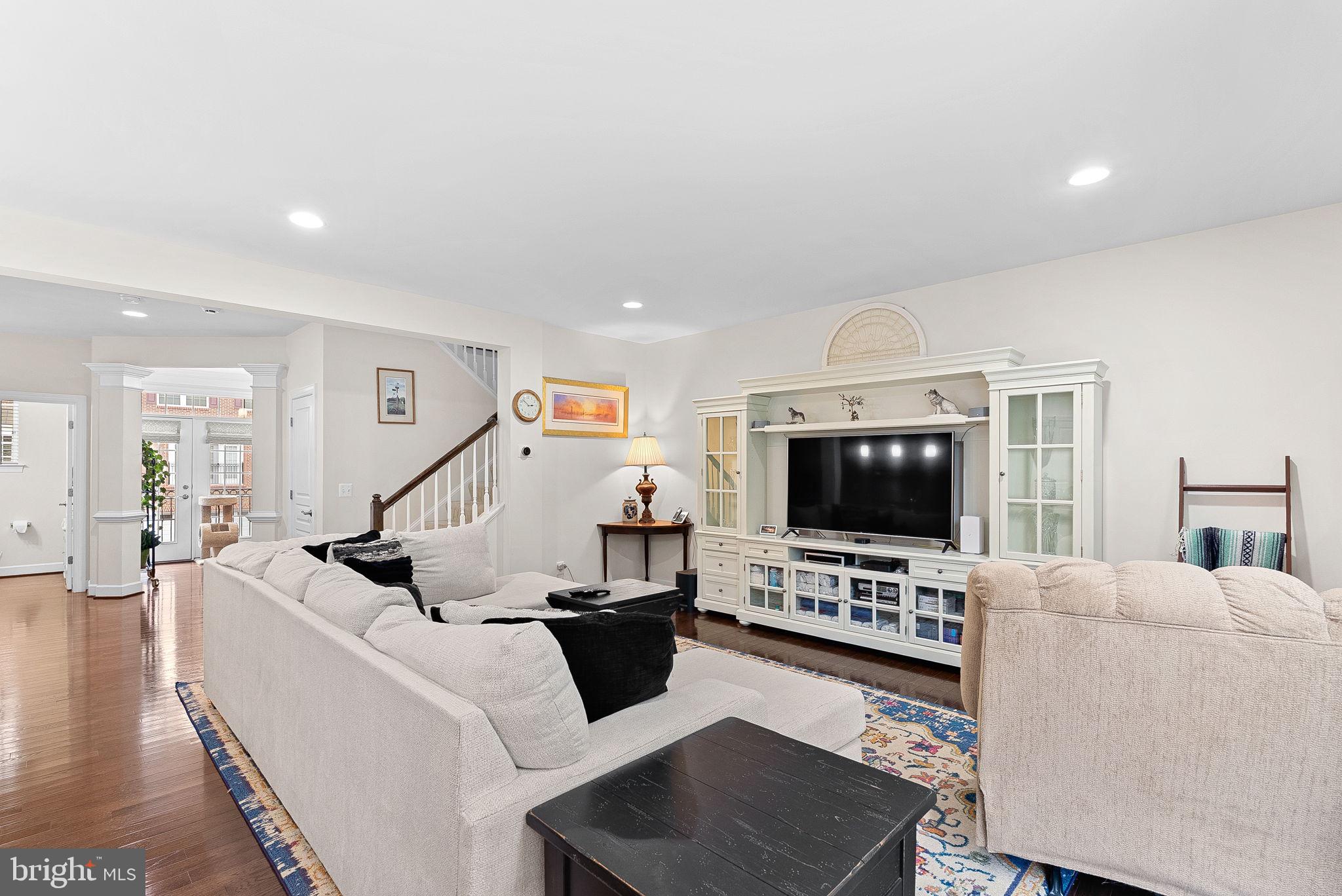 20281 Center Brook Square Sterling, VA 20165 - Photo 9 of 51 a living room with furniture and a flat screen tv