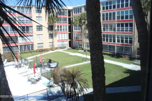 a view of swimming pool with patio