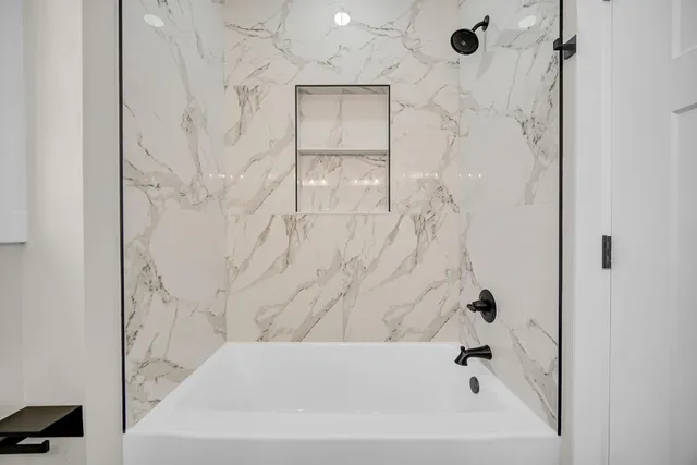 a bathroom with a bathtub