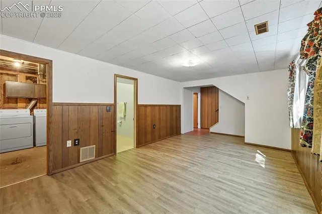 a view of a livingroom with wooden floor