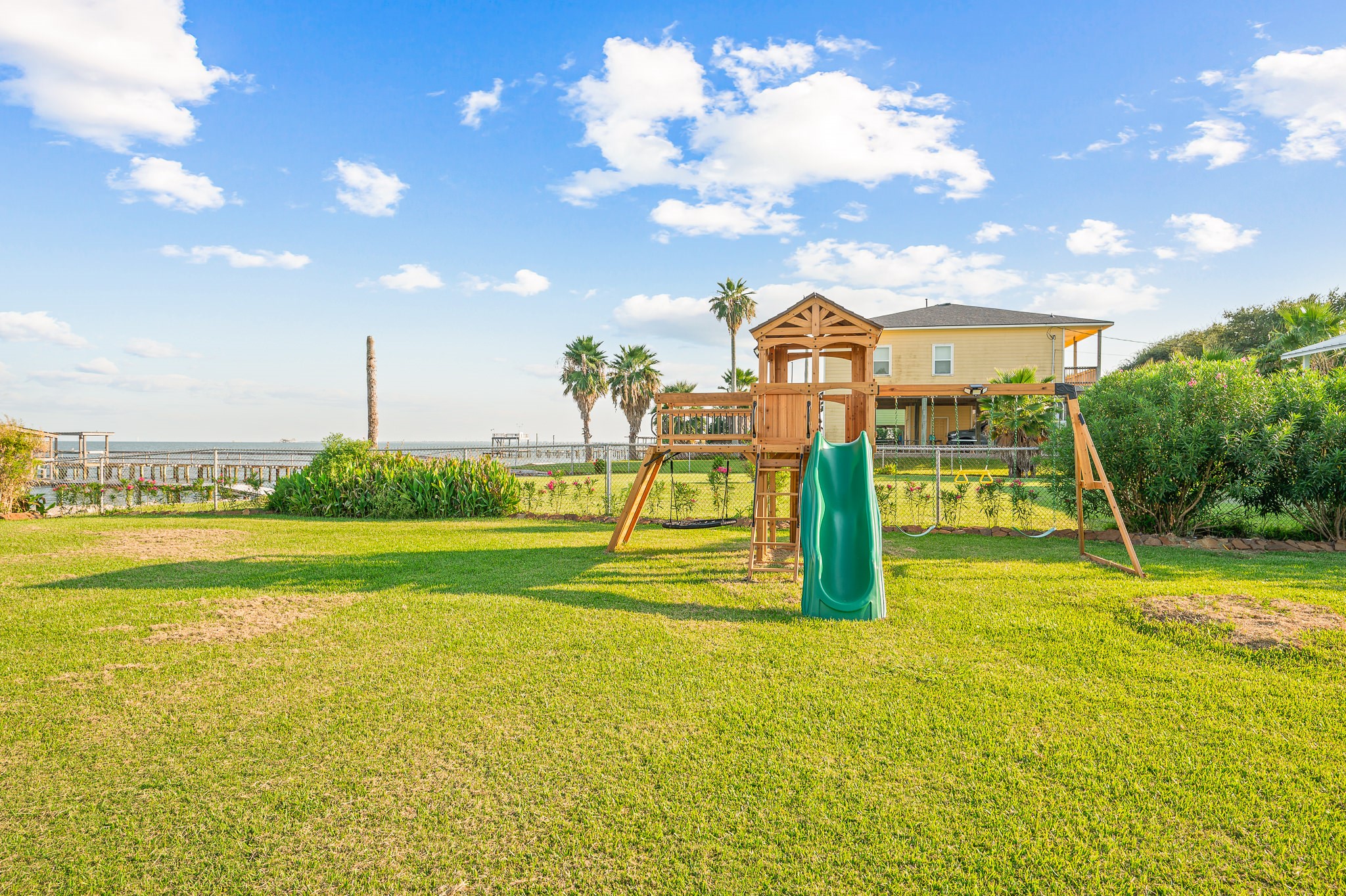815 5th Street Dickinson, TX 77539 - Photo 2 of 49 a view of a house with a big yard