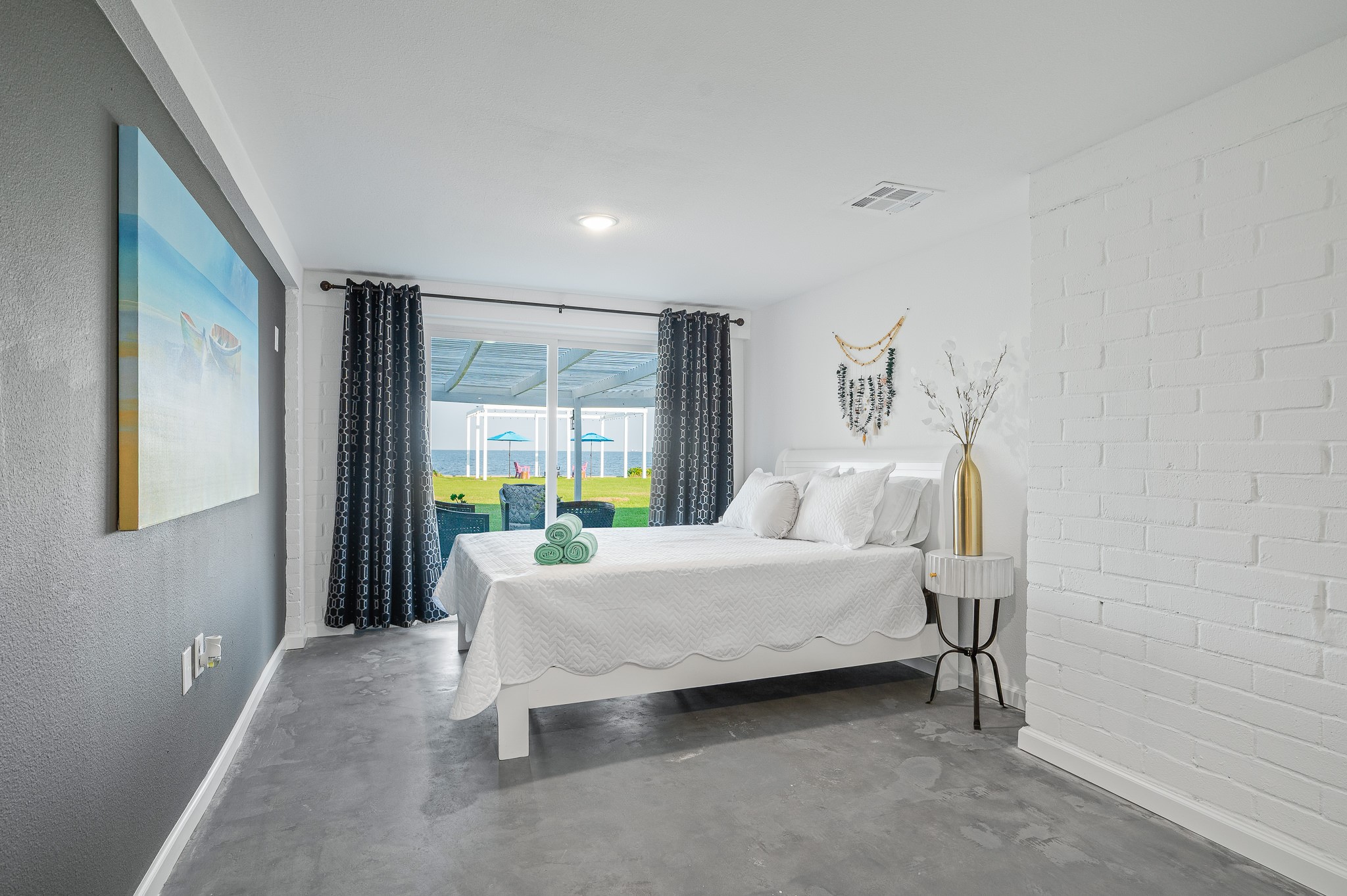 815 5th Street Dickinson, TX 77539 - Photo 26 of 49 a bedroom with a bed and large window