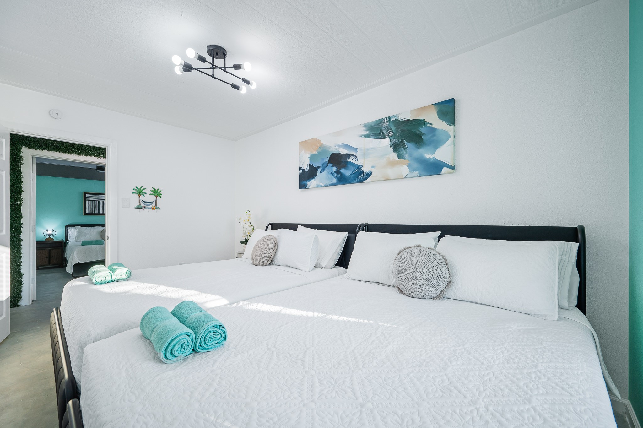 815 5th Street Dickinson, TX 77539 - Photo 39 of 49 a bedroom with a bed and a painting on the wall