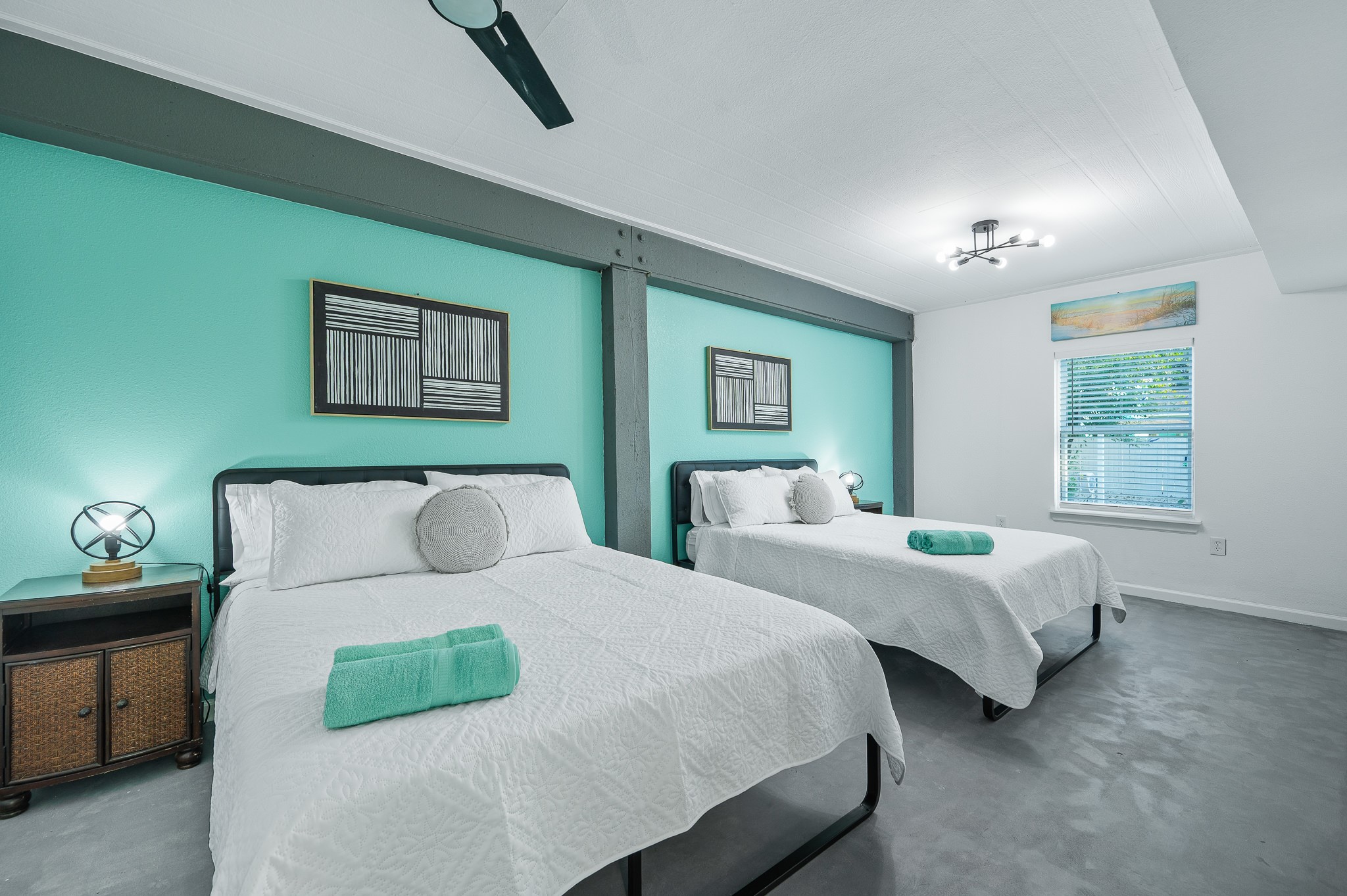 815 5th Street Dickinson, TX 77539 - Photo 40 of 49 a bedroom with two beds and a window