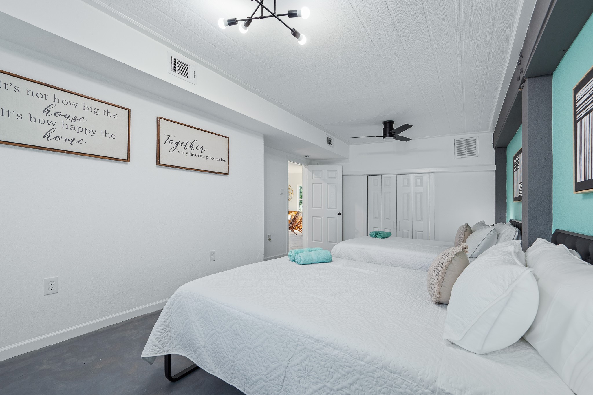 815 5th Street Dickinson, TX 77539 - Photo 42 of 49 a bedroom with a bed and a painting on the wall