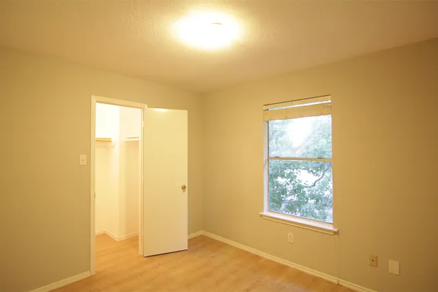 a view of an empty room and window
