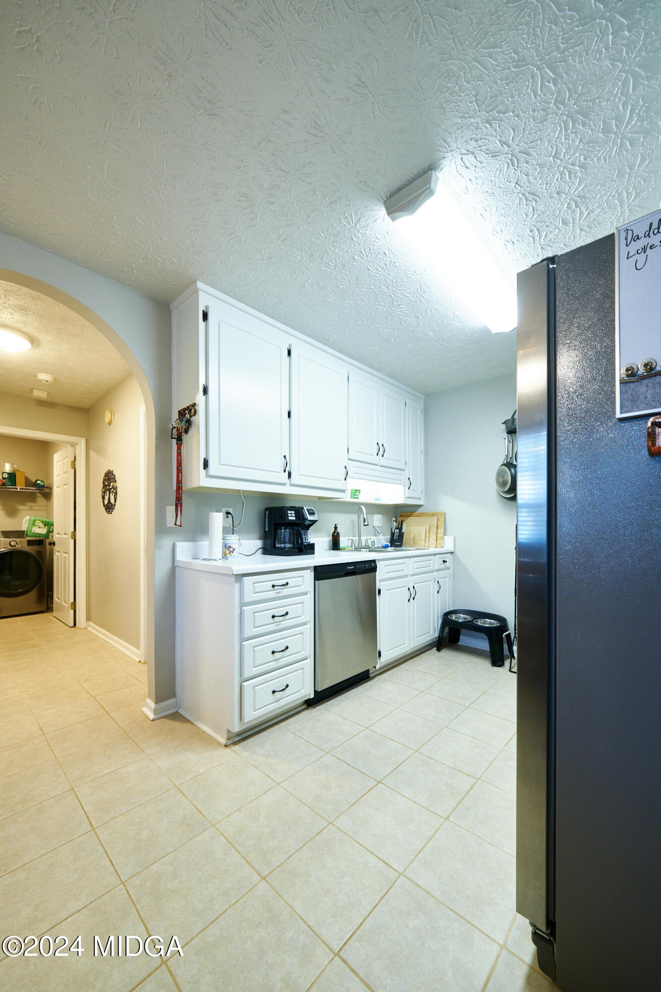 625 Windsor Drive Monroe, GA 30656 - Photo 17 of 27 a kitchen with a sink and cabinets
