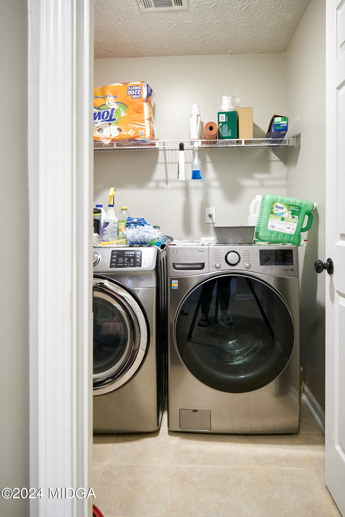 625 Windsor Drive Monroe, GA 30656 - Photo 18 of 27 a utility room with sink dryer and washer