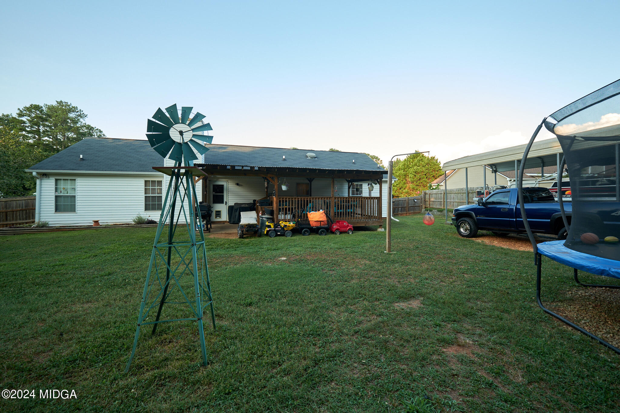 625 Windsor Drive Monroe, GA 30656 - Photo 21 of 27 a front view of a house with a yard table and chairs