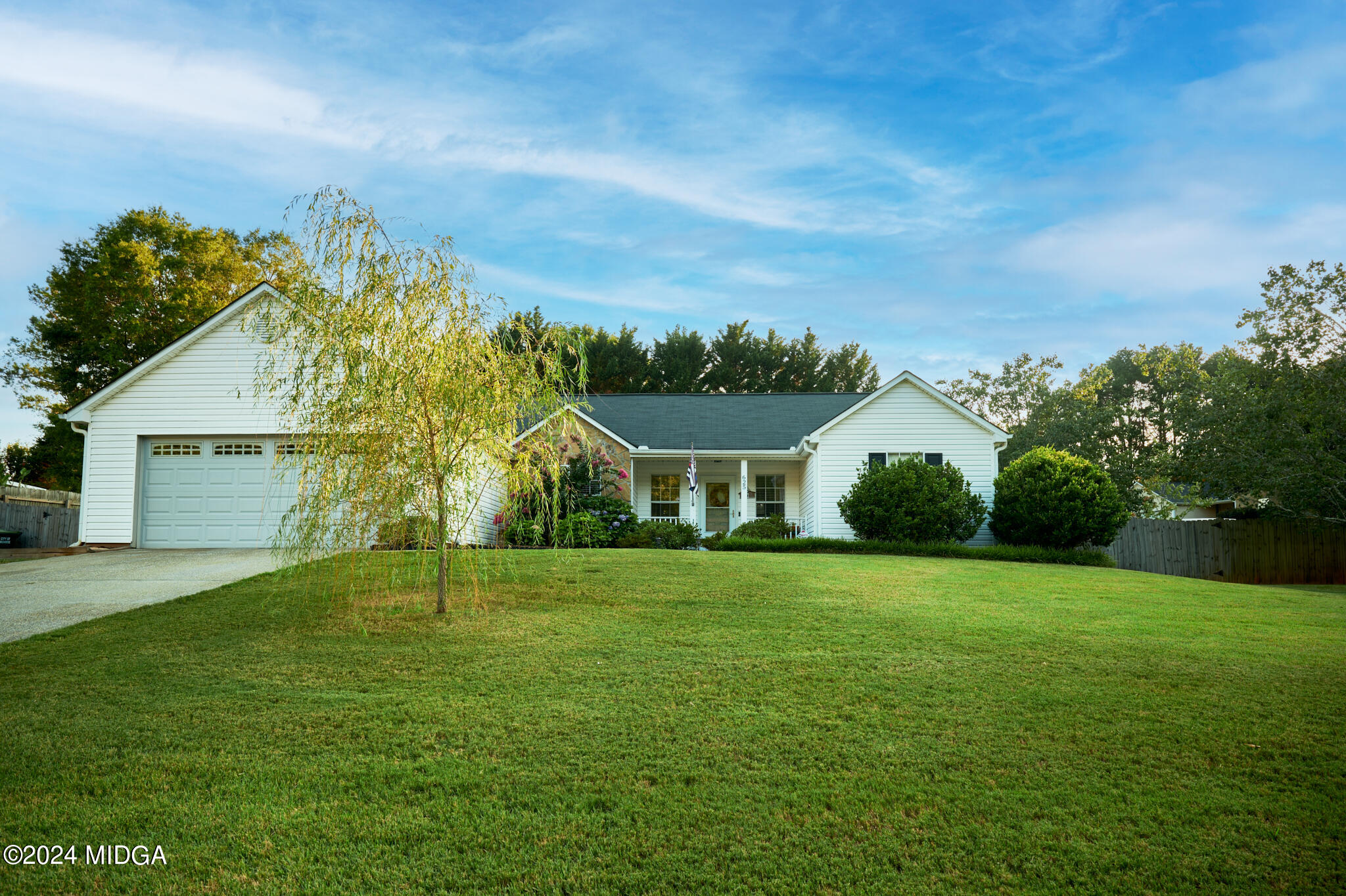 625 Windsor Drive Monroe, GA 30656 - Photo 24 of 27 a front view of a house with a yard