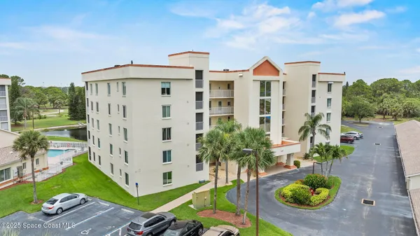 a front view of house with yard and outdoor seating
