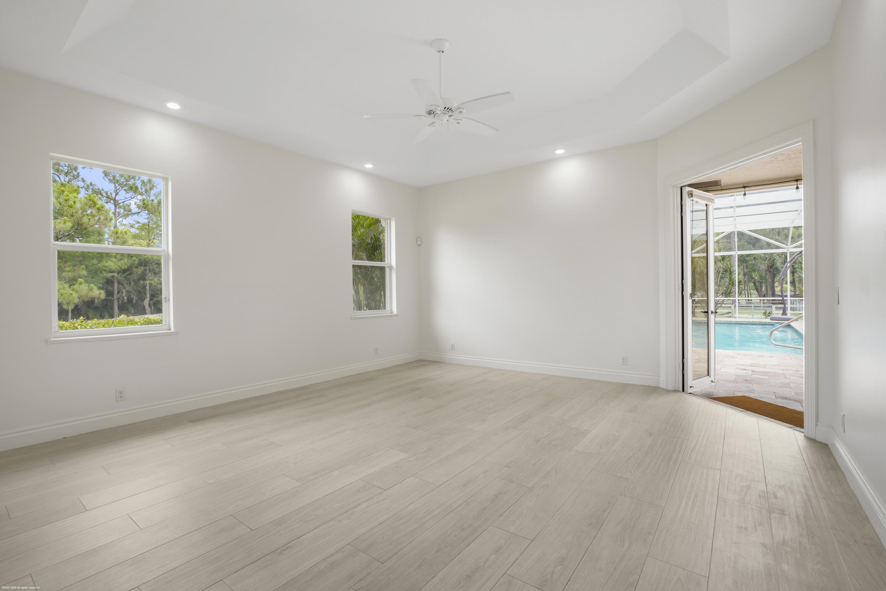 2560 Buck Ridge Trail Loxahatchee, FL 33470 - Photo 23 of 65 Primary Suite