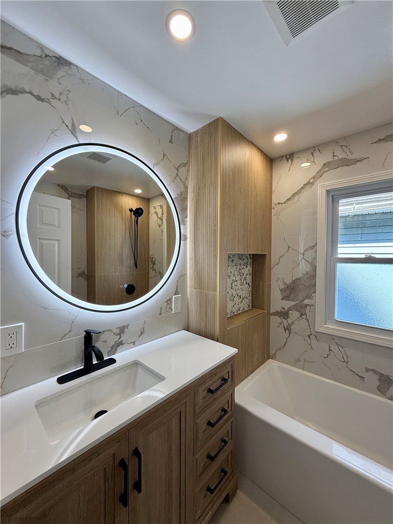 171 Cedarwood Terrace Rochester, NY 14609 - Photo 19 of 29 The second floor bathroom does not disappoint.