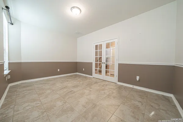 an empty room with windows