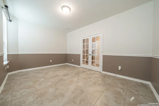 an empty room with windows