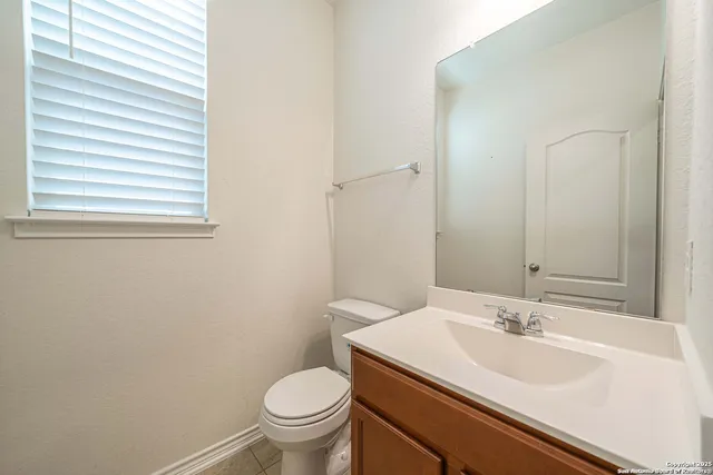 a bathroom with a sink and a toilet
