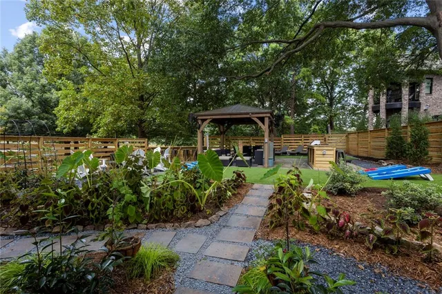 a view of a chairs and table on the deck