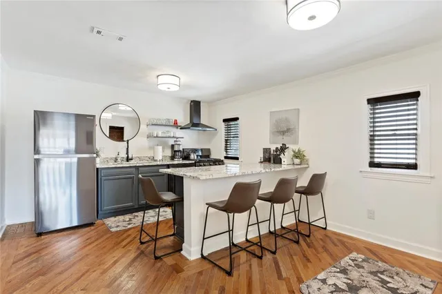 a bedroom with bed and window