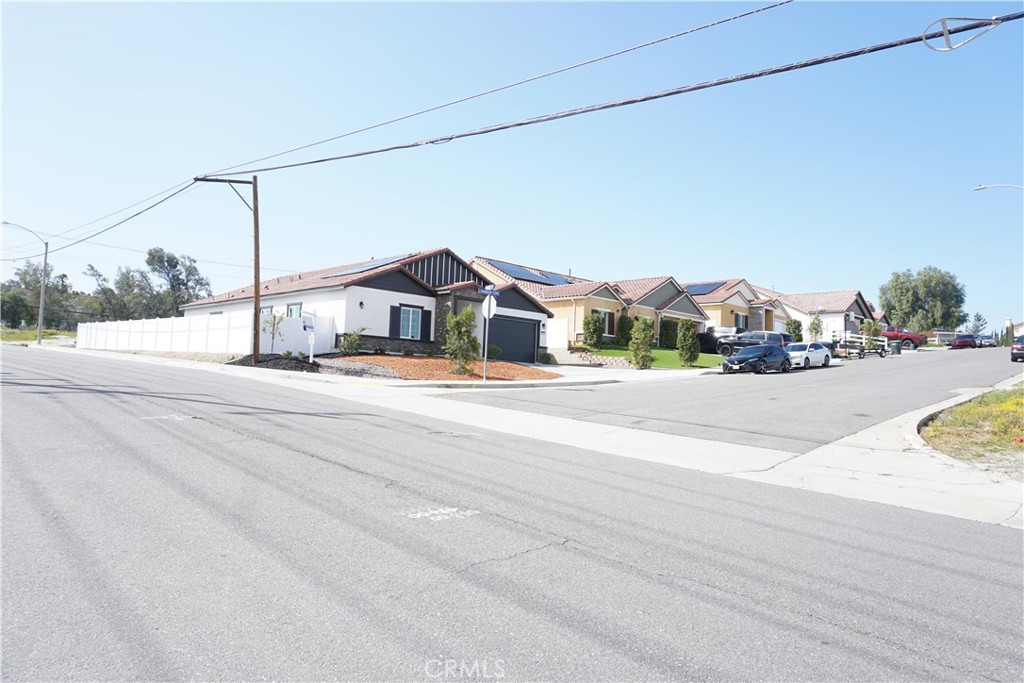 128 Chumash Perris, CA 92570 - Photo 22 of 22 a view of houses with a street