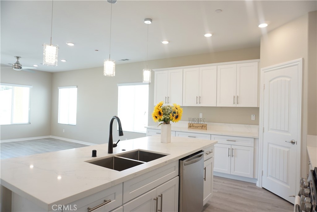 128 Chumash Perris, CA 92570 - Photo 6 of 22 a kitchen with a sink cabinets and window