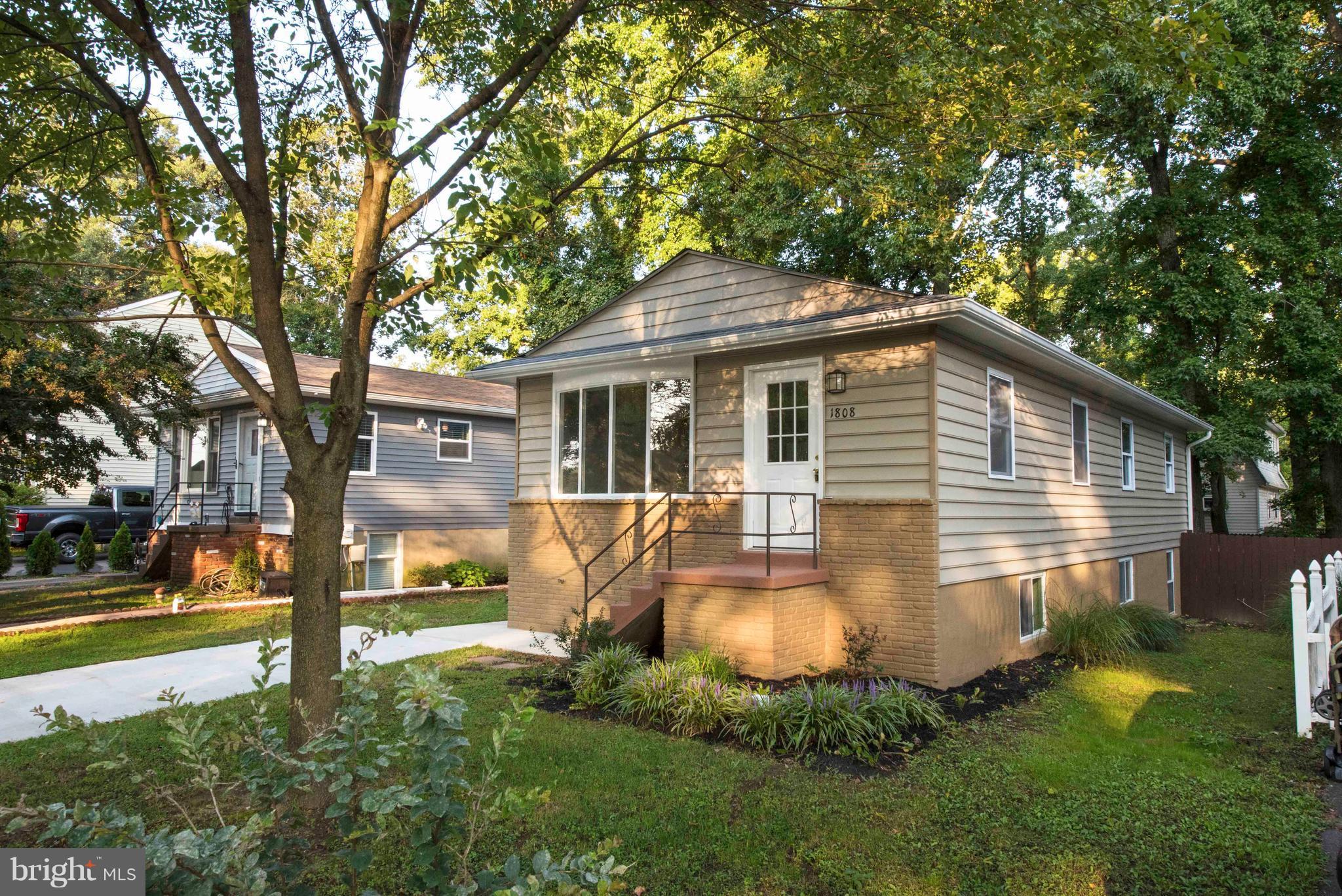 1808 Glenarm Road Edgewater, MD 21037 - Photo 1 of 29 a front view of a house with yard and green space