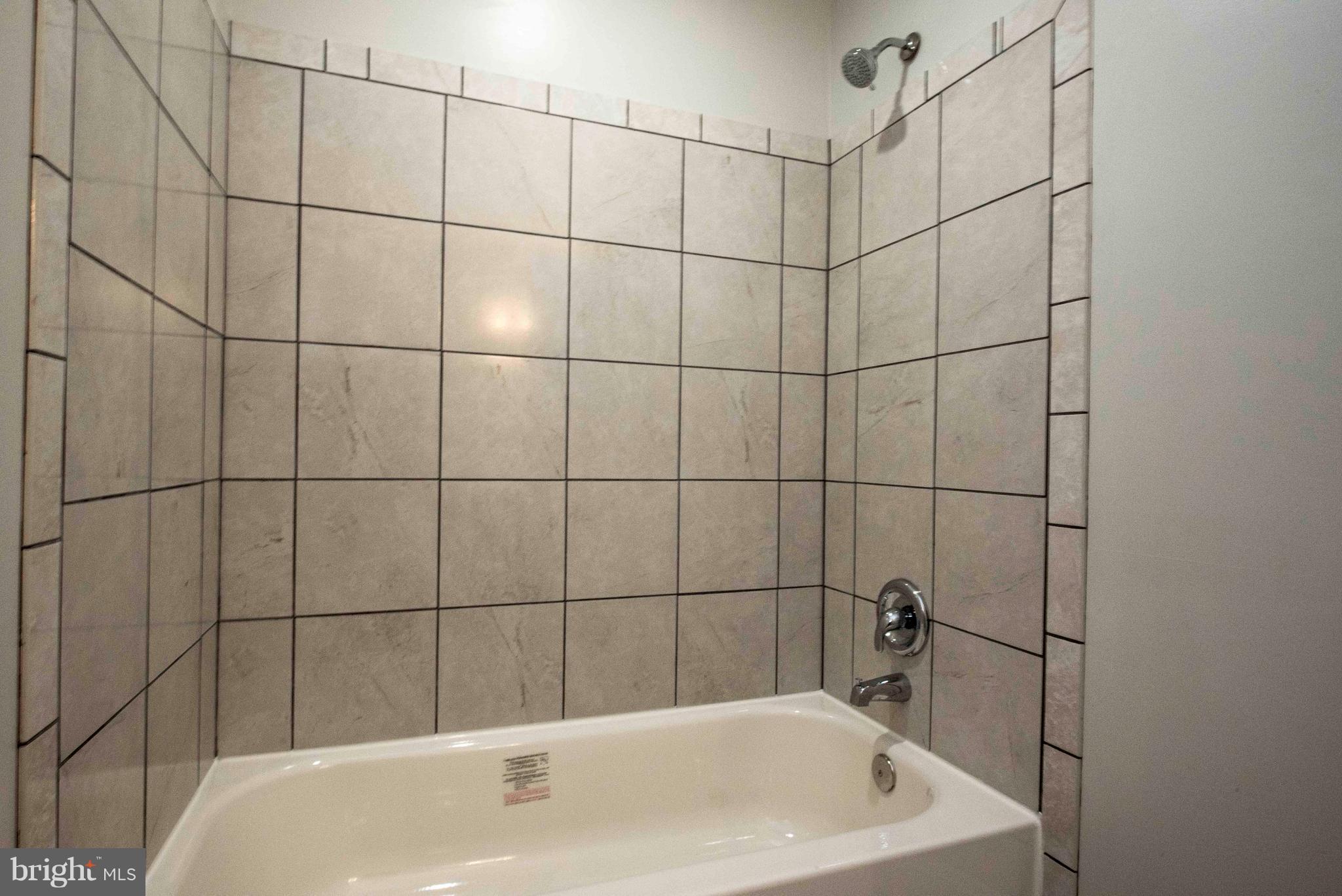 1808 Glenarm Road Edgewater, MD 21037 - Photo 19 of 29 a bathroom with a bathtub