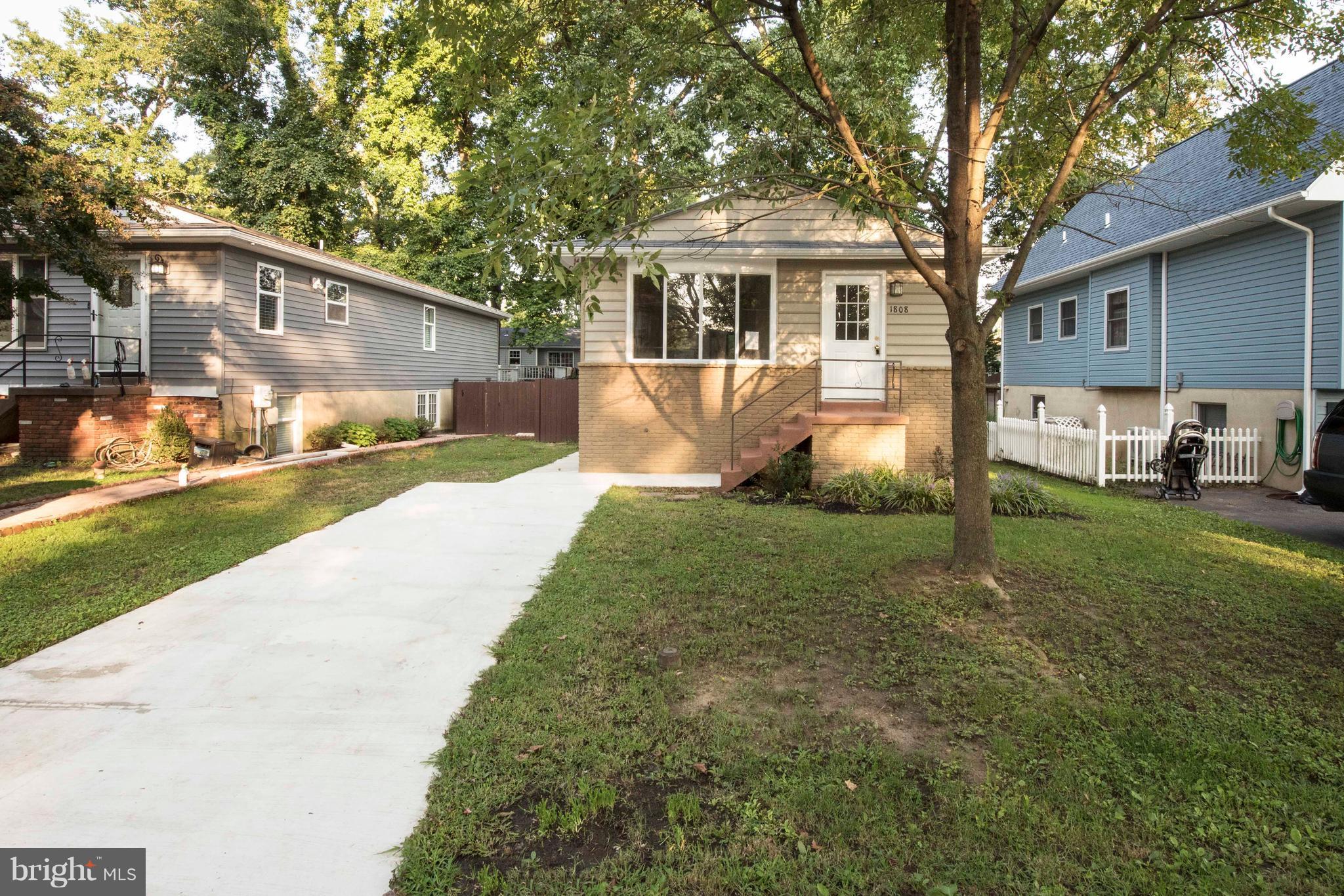 1808 Glenarm Road Edgewater, MD 21037 - Photo 3 of 29 a view of a yard in front of a house