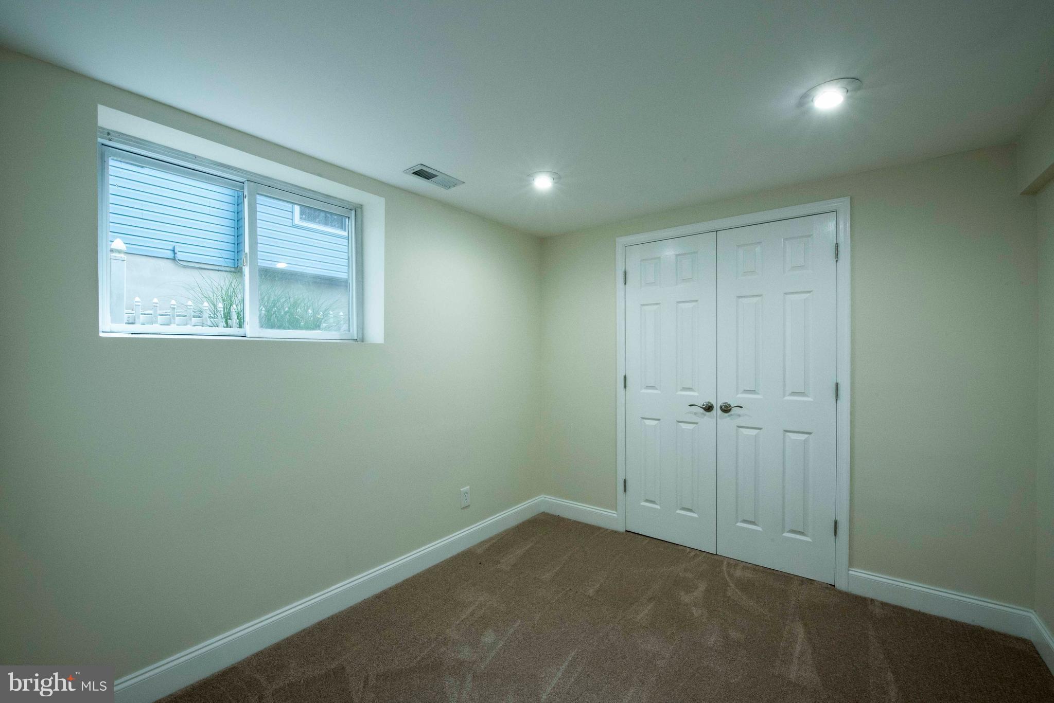 1808 Glenarm Road Edgewater, MD 21037 - Photo 22 of 29 a view of an empty room with a window