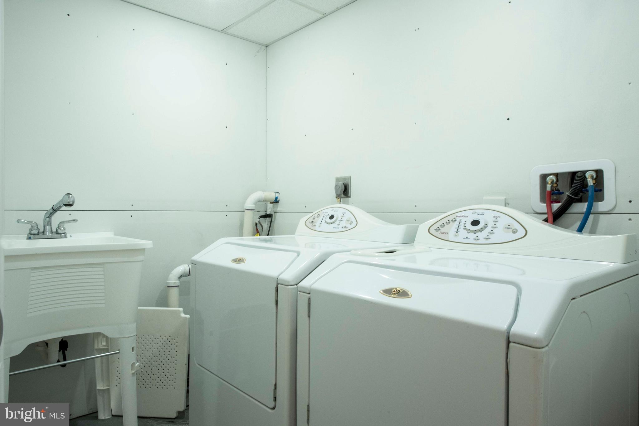 1808 Glenarm Road Edgewater, MD 21037 - Photo 26 of 29 a utility room with dryer and washer
